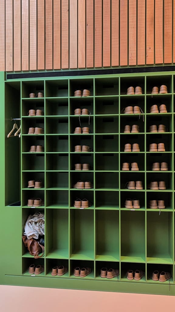 Striking green shoe cubby hole at the war rooms