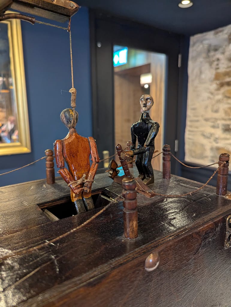 A hanging scene in the Chapel Bar
